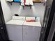 Laundry room with washer and dryer, and storage shelves at 1950 Summer Club Dr # 202, Oviedo, FL 32765