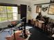 Unique room with drum set, antique desk, and unique decorations at 1950 Summer Club Dr # 202, Oviedo, FL 32765