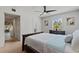 This bedroom has a ceiling fan, a Queen-size bed, and an attached bath at 200 Maitland Ave # 19, Altamonte Springs, FL 32701