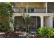 Exterior view of the property with a screened lanai at 200 Maitland Ave # 19, Altamonte Springs, FL 32701