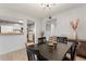 Dining room showcasing a dining table with seating, with a pass-through to the kitchen at 200 Maitland Ave # 19, Altamonte Springs, FL 32701