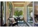 Relaxing lanai with comfortable seating and views of lush greenery at 200 Maitland Ave # 19, Altamonte Springs, FL 32701