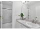 Clean bathroom featuring a shower and a double vanity at 2607 Stanmore Ct, Orlando, FL 32817