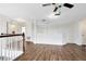 Upstairs loft area with wood floors at 2607 Stanmore Ct, Orlando, FL 32817