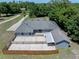 Aerial view showcasing the property's layout, spacious patio, and surrounding greenery at 2633 Pickett Downs Dr, Chuluota, FL 32766