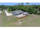 Aerial view of the home showcasing the backyard patio, spacious layout and mature landscaping at 2633 Pickett Downs Dr, Chuluota, FL 32766