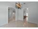 Open-concept dining area with modern lighting and easy access to other rooms at 2633 Pickett Downs Dr, Chuluota, FL 32766