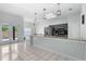 Open kitchen with granite countertops, stainless steel appliances, and tile flooring at 2633 Pickett Downs Dr, Chuluota, FL 32766