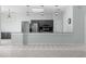 Kitchen with sleek stainless steel appliances, granite countertops and modern lighting at 2633 Pickett Downs Dr, Chuluota, FL 32766