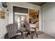Private outdoor patio area perfect for relaxation with chairs and access to the living room at 2818 Plaza Terrace Dr # 2818, Orlando, FL 32803