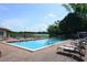 Community pool with lounge chairs for residents to enjoy swimming and sunbathing at 2818 Plaza Terrace Dr # 2818, Orlando, FL 32803