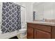 This bathroom features a shower and tub combination with decorative shower curtain at 2940 Nottel Dr, St Cloud, FL 34772