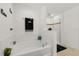 Bathroom featuring a soaking tub, separate shower and decorative accents at 2940 Nottel Dr, St Cloud, FL 34772