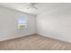 Empty bedroom featuring neutral walls, carpeting and a window at 2940 Nottel Dr, St Cloud, FL 34772