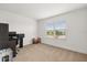 Bedroom featuring neutral carpet and a window with natural light at 2940 Nottel Dr, St Cloud, FL 34772