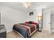 This bedroom features a ceiling fan and stylish decor at 2940 Nottel Dr, St Cloud, FL 34772