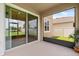 Covered patio with a screen enclosure and sliding glass doors to the interior at 2940 Nottel Dr, St Cloud, FL 34772