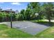 Community basketball court offering an outdoor recreational space for residents at 303 S Sweetwater Blvd, Longwood, FL 32779