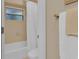 Clean bathroom with a shower-tub and a neutral color palette at 303 S Sweetwater Blvd, Longwood, FL 32779