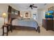 Comfortable bedroom with natural light, a ceiling fan, and furnishings at 303 S Sweetwater Blvd, Longwood, FL 32779