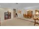 Open-concept dining room with stone accent wall and seamless flow to other living spaces at 303 S Sweetwater Blvd, Longwood, FL 32779