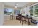 Bright home office with large windows, a comfortable chair, and modern amenities at 303 S Sweetwater Blvd, Longwood, FL 32779