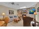 Comfortable living room with stone fireplace and a view of a TV at 303 S Sweetwater Blvd, Longwood, FL 32779