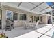 Outdoor patio space featuring furniture and a barbecue grill, ideal for entertaining guests at 303 S Sweetwater Blvd, Longwood, FL 32779