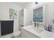 Bright bathroom with white vanity, sleek countertops, and stylish decor accents at 3054 Bluebrook Dr, Winter Park, FL 32792