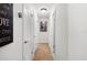 Bright hallway with wood floors, complemented by crisp white walls and modern fixtures at 3054 Bluebrook Dr, Winter Park, FL 32792