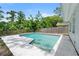 Private backyard pool with a spacious deck and lush landscaping providing plenty of shade at 3054 Bluebrook Dr, Winter Park, FL 32792