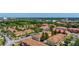 Aerial view showcasing the community's layout, including homes, trees, and surrounding green spaces at 3112 Seaview Castle Dr, Kissimmee, FL 34746