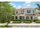 Charming townhome featuring well-manicured landscaping and a welcoming front porch at 3112 Seaview Castle Dr, Kissimmee, FL 34746