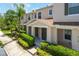 Inviting facade featuring a well-maintained lawn and neutral color palette at 3112 Seaview Castle Dr, Kissimmee, FL 34746