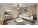 Stylish living room featuring modern furnishings and an open layout to the kitchen at 3112 Seaview Castle Dr, Kissimmee, FL 34746