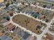 Aerial view of the neighborhood showcases the community layout and well-manicured landscaping at 325 Aldridge Ln, Davenport, FL 33897