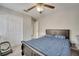 Carpeted bedroom with a bed and adjacent doorway at 325 Aldridge Ln, Davenport, FL 33897