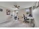 Carpeted bedroom with ceiling fan and office space at 325 Aldridge Ln, Davenport, FL 33897