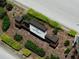 Beautiful landscaping surrounds the community sign, creating a welcoming entrance for residents and visitors at 325 Aldridge Ln, Davenport, FL 33897