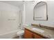 Bathroom featuring granite vanity and a shower-tub combo at 3591 Sandlor Dr, Deltona, FL 32738