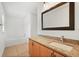 Bathroom featuring a granite vanity and tub at 3591 Sandlor Dr, Deltona, FL 32738