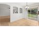 Light-filled dining area with sliding glass door access to outdoor space at 3591 Sandlor Dr, Deltona, FL 32738