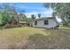 This home includes a spacious backyard with ample room for activities at 37 N Tymber Crk, Ormond Beach, FL 32174