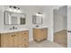 Updated bathroom featuring double vanities, modern fixtures, and bright lighting at 37 N Tymber Crk, Ormond Beach, FL 32174