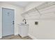 Laundry room with sink and shelving at 37 N Tymber Crk, Ormond Beach, FL 32174