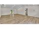 Large living room with luxury vinyl flooring and access to the backyard at 37 N Tymber Crk, Ormond Beach, FL 32174