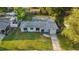 An aerial front view showcases the home's layout, landscaping, and neighborhood surroundings at 3927 Citadel Dr, Orlando, FL 32839