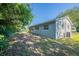 Backyard view featuring a lush green area and plenty of shade at 4226 Kelly Miller Ct, Orlando, FL 32811