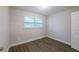 Bedroom boasting natural light, wood-look floors, and neutral walls at 4226 Kelly Miller Ct, Orlando, FL 32811