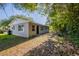 Single story home with neutral paint color and a view of the backyard at 4226 Kelly Miller Ct, Orlando, FL 32811